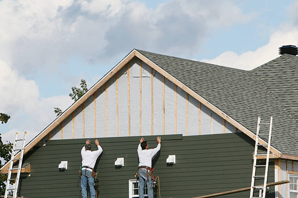 Professional Siding Installation technician working in Dresher, PA